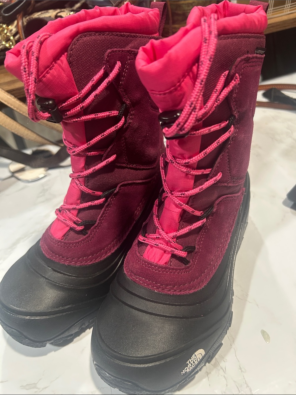 The North Face Kids Waterproof Snow Boots in Burgundy and Pink